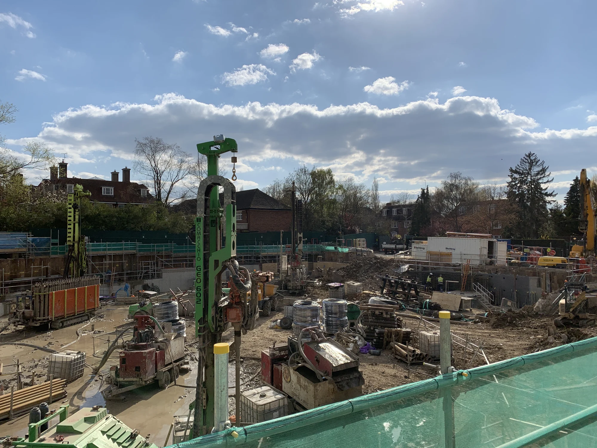 Drilling operations within a complex construction site