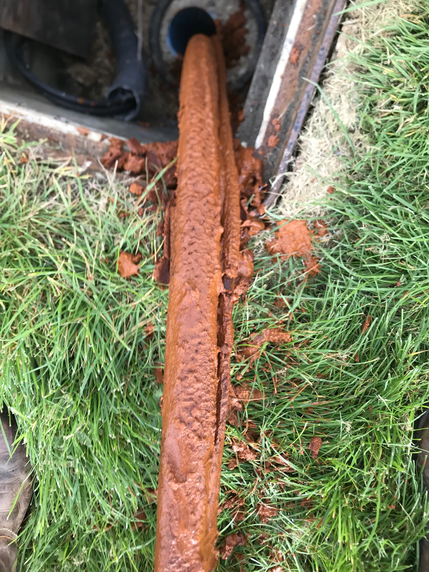 Discoloured water flowing from pipework during work on a water supply